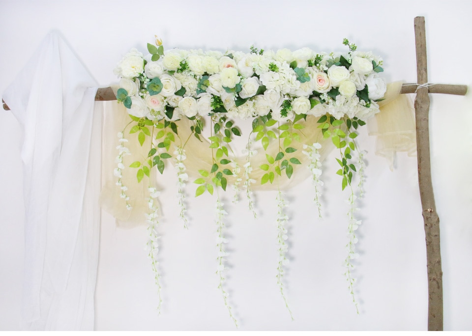 Decorating Your Wedding Arch with Flowers and Greenery
