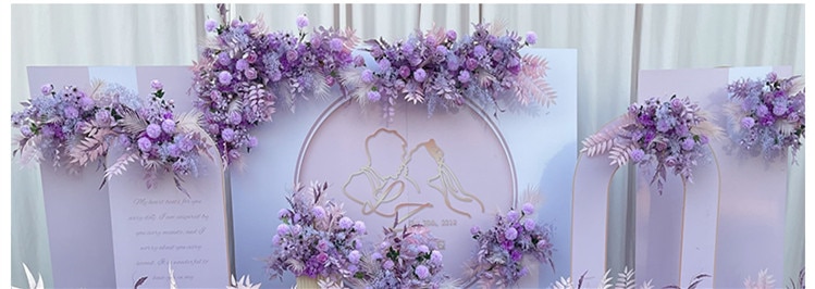 Decorating the arch with flowers and other embellishments