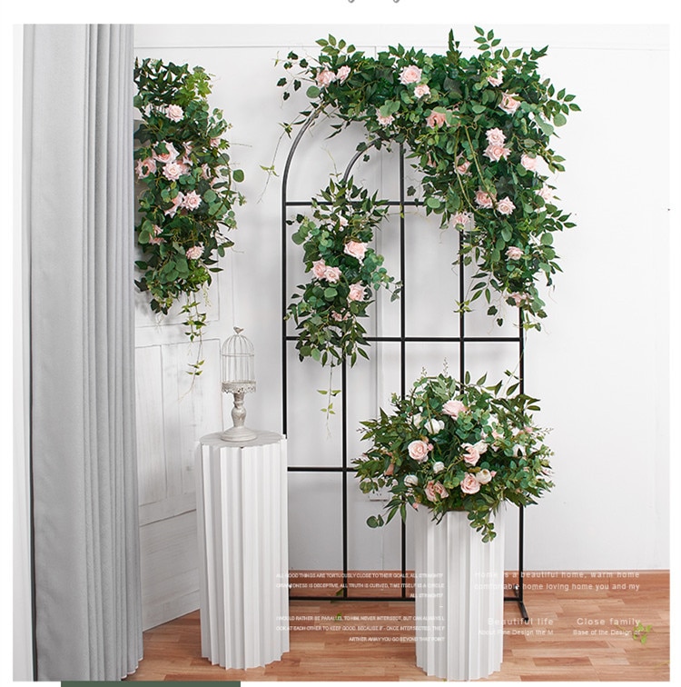 Floral arrangements: Incorporating fresh flowers and greenery into the canopy design.